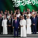 US President Donald Trump (centre left) and Saudi Crown Prince Mohammed bin Salman (centre right) pose for a photo with business leaders at the King Abdul Aziz International Conference Center while attending a Saudi-US business investment forum on May 13, 2025, in Riyadh, Saudi Arabia.